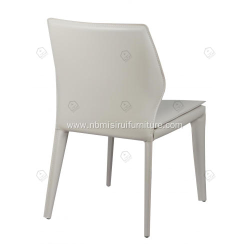 White saddle leather armless dining chairs